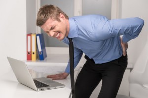 handsome man feeling pain in back.